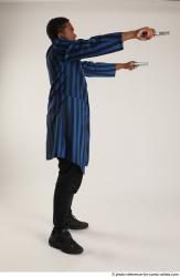 Garson STANDING POSE WITH GUNS 